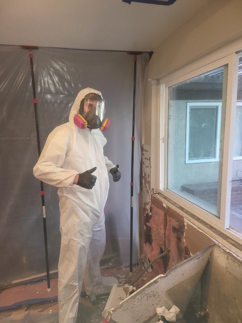 IICRC certified technician with protective equipment